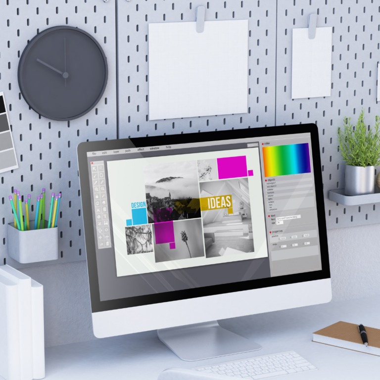 Ways to Display Houseplants: A computer at a desk accented by a planter on the peg wall behind it.